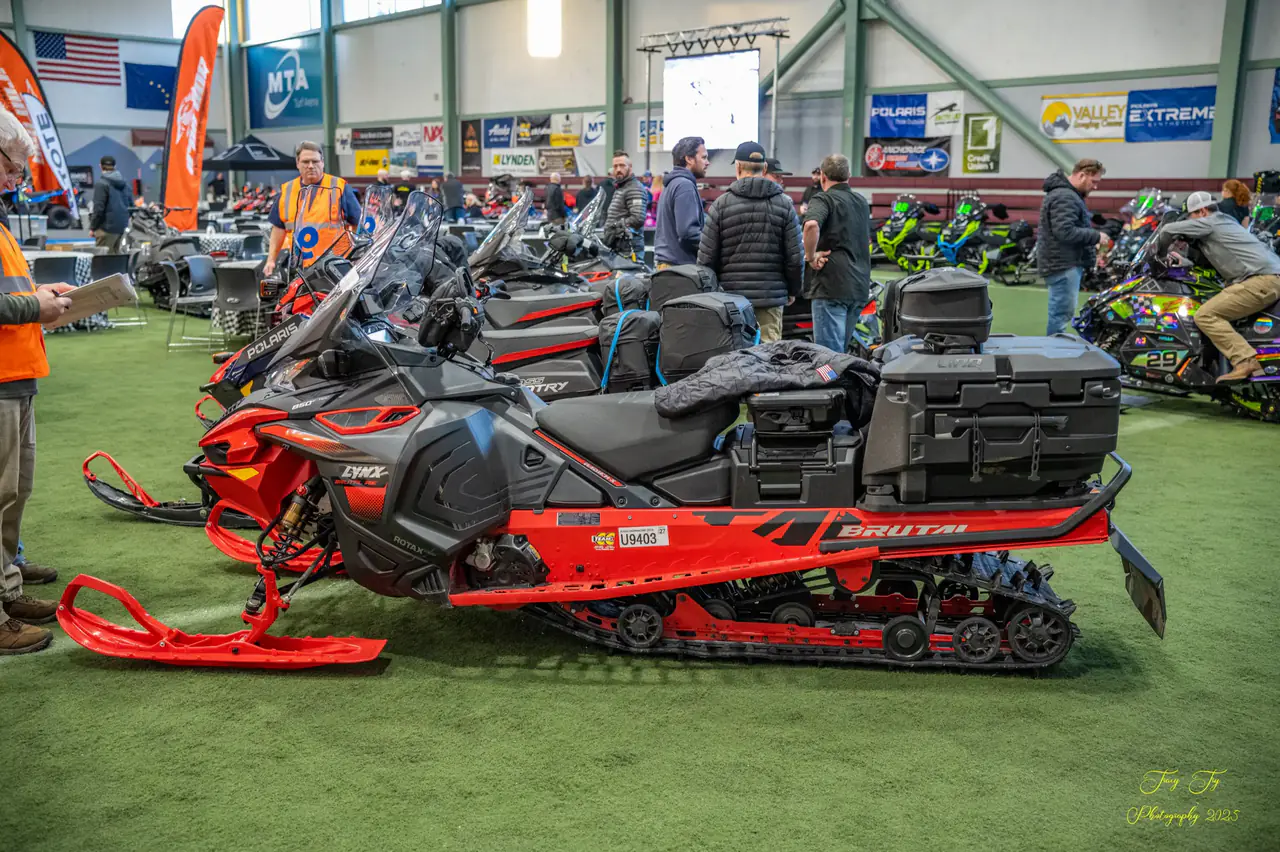 Teams and machines gathered indoors for the racer draw.